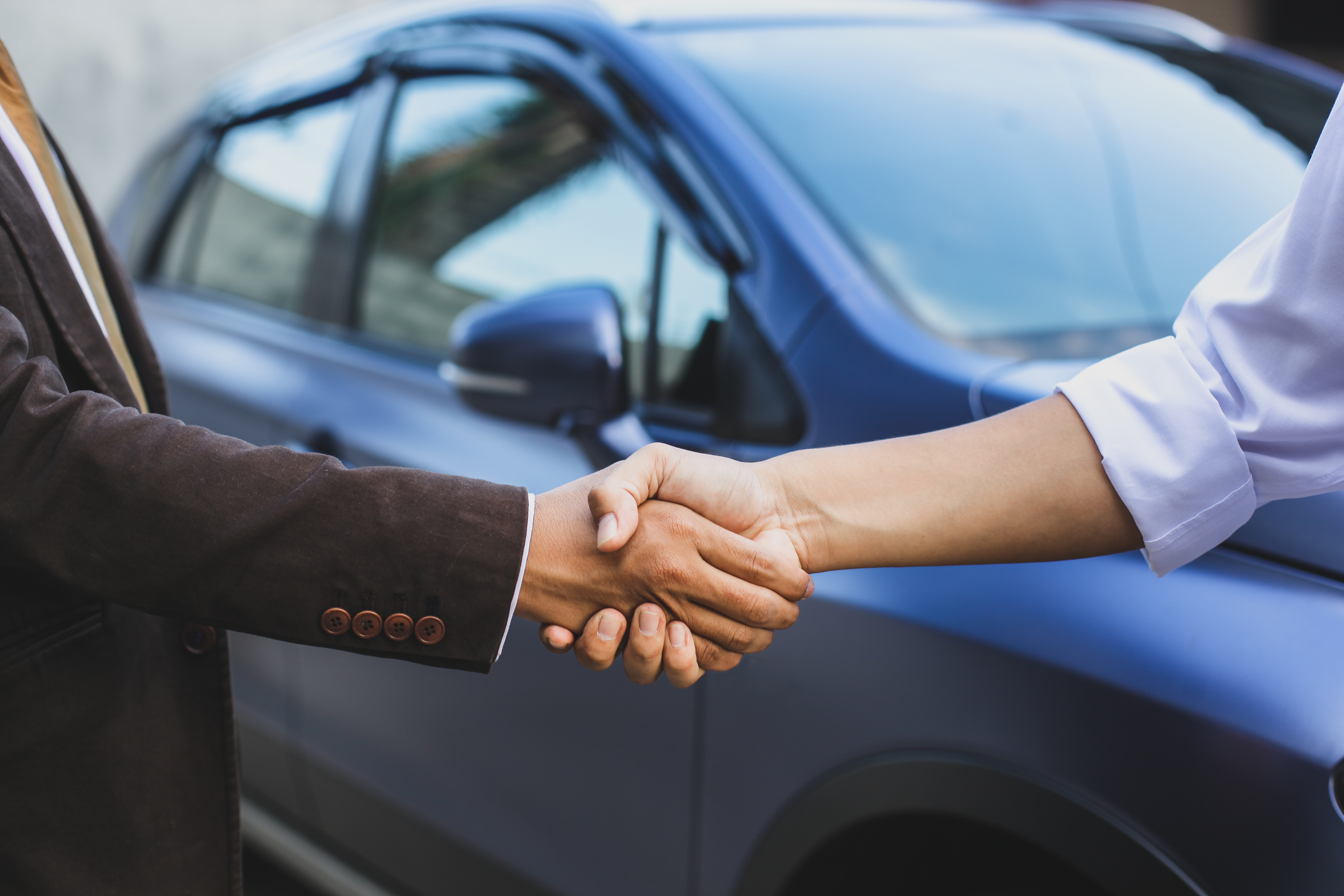Hand shaking for car dealing